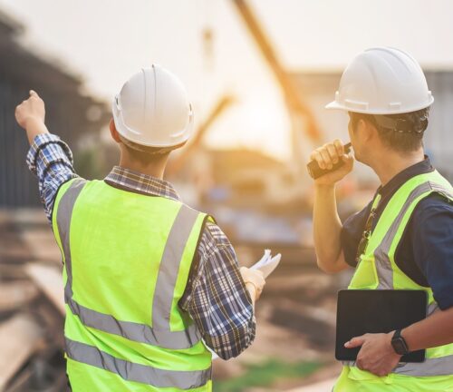 A,Team,Of,Civil,Engineers,And,Architects,Wearing,Safety,Gear